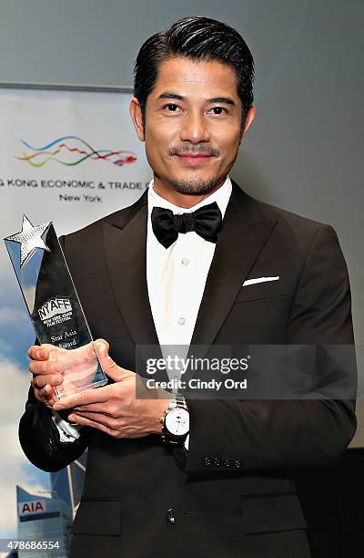 Actor/ singer Aaron Kwok recieves the NYAFF Star Asia Award during the 2015 New York Asian Film Festival at Walter Reade Theater on June 26, 2015 in...