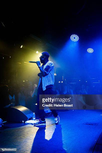 Tinchy Stryder performs at Stamford Bridge on June 26, 2015 in London, England.