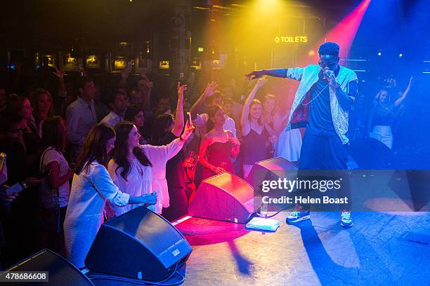 Tinchy Stryder performs at Stamford Bridge on June 26, 2015 in London, England.