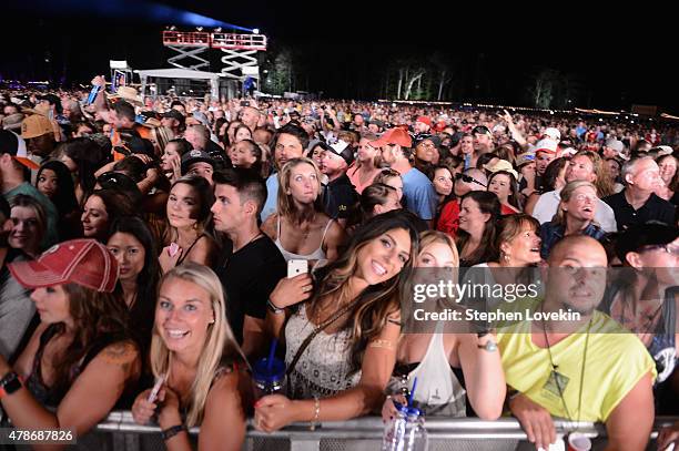 Guests enjoy the Blake Shelton performance during day 1 of the Big Barrel Country Music Festival on June 26, 2015 in Dover, Delaware.