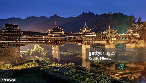 chengyang vento e a chuva panorama de ponte à noite, china - ponte coberta ponte - fotografias e filmes do acervo