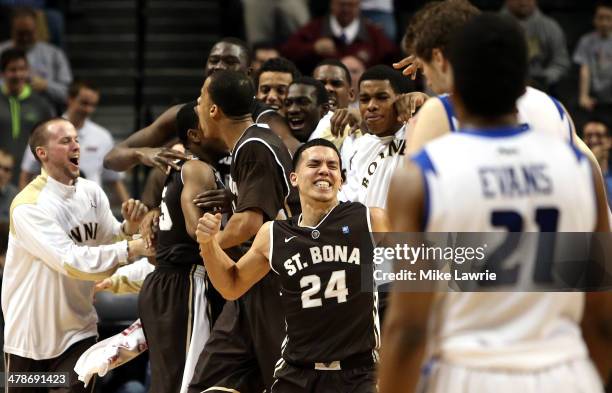 Matthew Wright of the St. Bonaventure Bonnies celebrates after a game winning basket by Jordan Gathers against the Saint Louis Billikens during the...