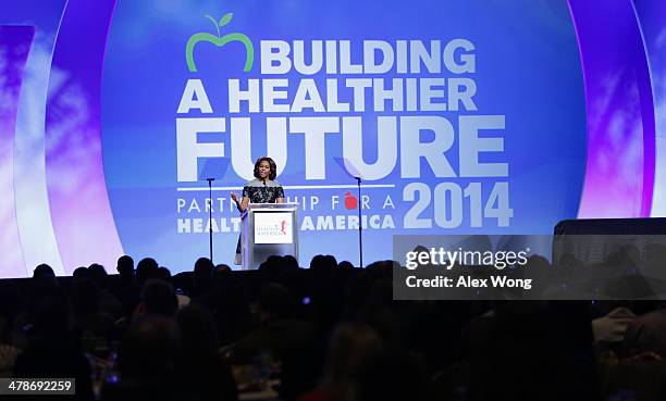 First lady Michelle Obama speaks during the "Building a Healthier Future Summit" of the Partnership for a Healthier America March 14, 2014 at the...