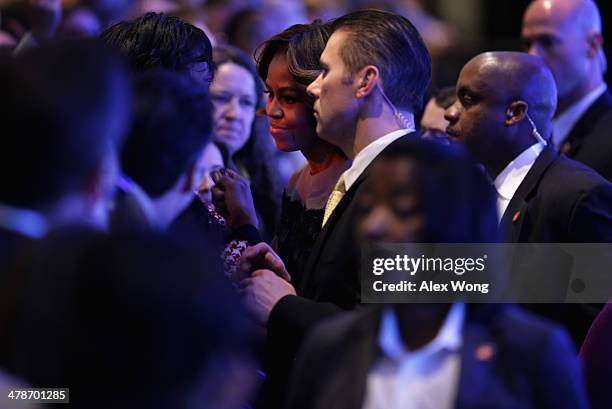 First lady Michelle Obama greets members of the audience during the "Building a Healthier Future Summit" of the Partnership for a Healthier America...