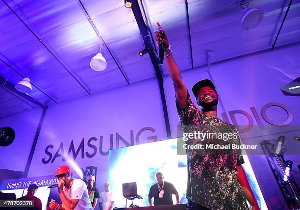 Recording artists RJ and rapper Casey Veggies perform onstage at a Roc Nation curated Samsung exclusive concert at Samsung Studio LA on June 26, 2015...