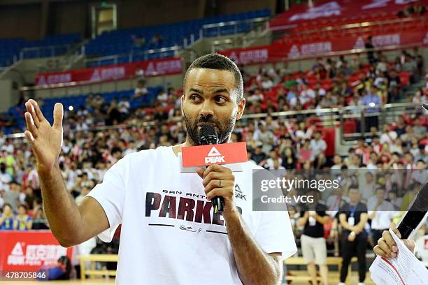 Star Tony Parker talks during his visit in China on June 26, 2015 in Shaoxing, Zhejiang province of China.
