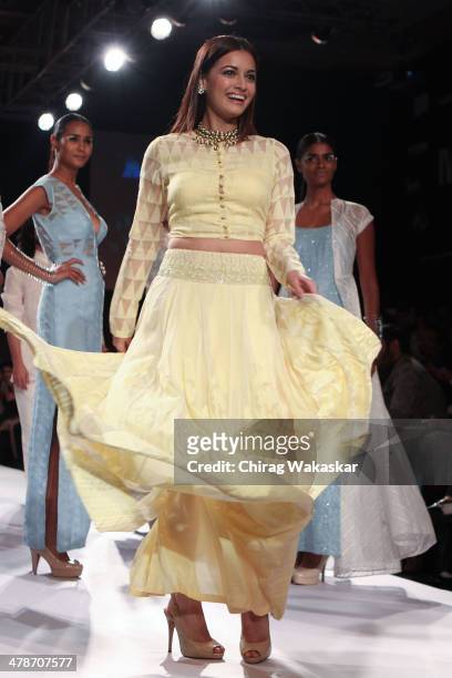 Dia Mirza walks the runway wearing designs by Anita Dongre at day 4 of Lakme Fashion Week Summer/Resort 2014 at the Grand Hyatt on March 14, 2014 in...