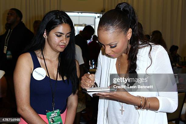 Chrystal Aguilera and Recording artist Tamar Braxton attend the BET & Make A Wish Foundation Recipients Attend Day 1 BET Awards Weekend Sprite Radio...