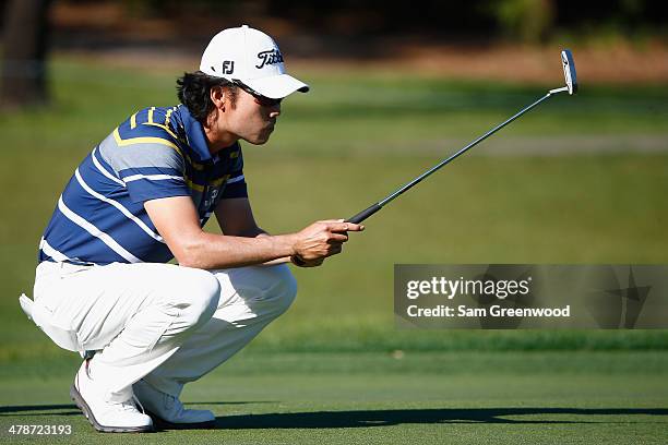 Kevin Na assesses a shot on the 7th green during the second round of the Valspar Championship at Innisbrook Resort and Golf Club on March 14, 2014 in...