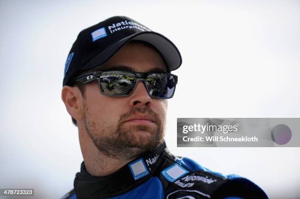 Ricky Stenhouse Jr., driver of the Nationwide Insurance Ford, stands on the grid during qualifying for the NASCAR Sprint Cup Series Food City 500 at...