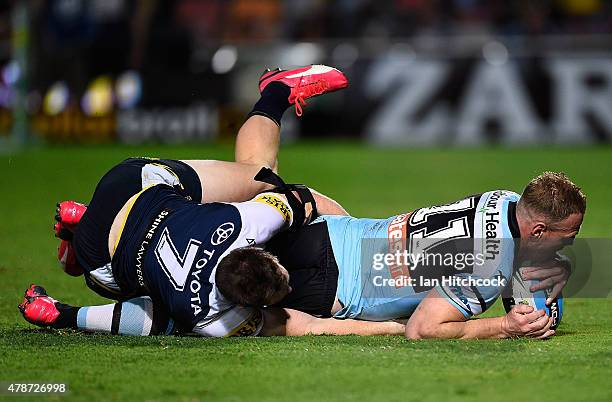 Luke Lewis of the Sharks scores a try during the round 16 NRL match between the North Queensland Cowboys and the Cronulla Sharks at 1300SMILES...