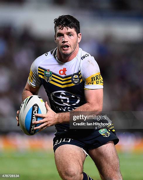 Lachlan Coote of the Cowboys runs the ball during the round 16 NRL match between the North Queensland Cowboys and the Cronulla Sharks at 1300SMILES...
