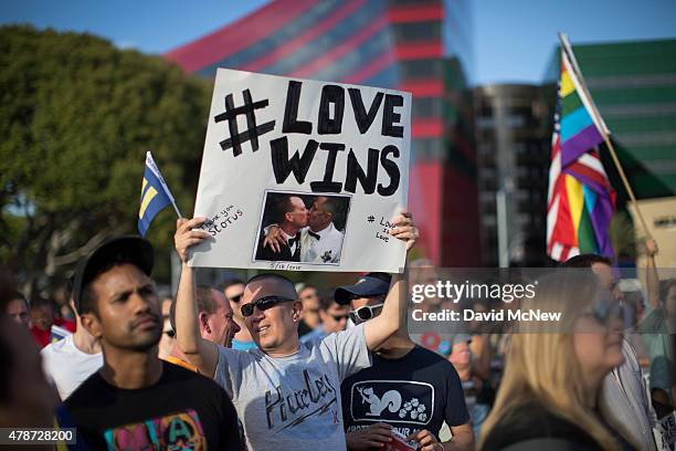 People celebrate the Supreme Court ruling on same-sex marriage on June 26, 2015 in West Hollywood, California. The Supreme Court ruled today that...