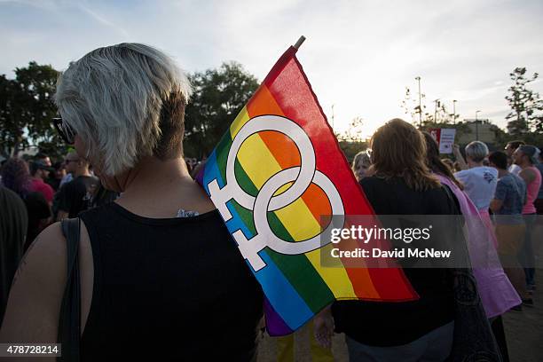 People celebrate the Supreme Court ruling on same-sex marriage on June 26, 2015 in West Hollywood, California. The Supreme Court ruled today that...