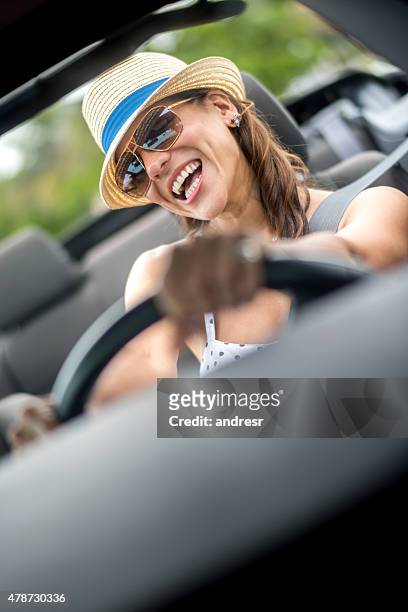 woman renting a convertible car - car sunshade stock pictures, royalty-free photos & images