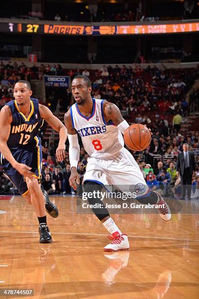 Tony Wroten of the Philadelphia 76ers drives to the basket against the Indiana Pacers at the Wells Fargo Center on March 14, 2014 in Philadelphia,...