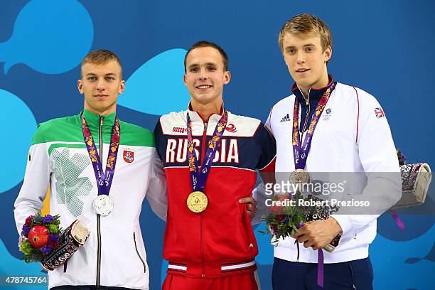 Silver medalist Andrius Sidlauskas of Lithuania, gold medalist Anton Chupkov of Russia and bronze medalist Charlie Attwood of Great Britain stand on...