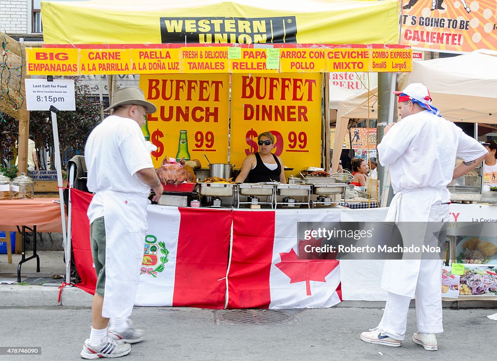 Salsa on St. Saint Clair Festival Scenes: Two men in chef...