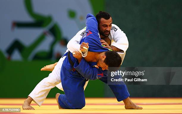 Ilias Iliadis of Greece and Beka Gviniashvili of Georgia compete in the Men's Judo -90kg Bronze Final during day fifteen of the Baku 2015 European...