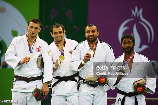 Silver medalist Varlam Liparteliani of Georgia, gold medalist Kirill Denisov of Russia, bronze medalist Ilias Iliadis of Greece and bronze medalist...