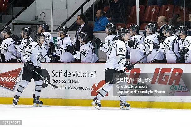 Simon Tardif-Richard and Martin Reway of the Gatineau Olympiques celebrate a first-period goal at the bench against the Sherbrooke Phoenix during the...