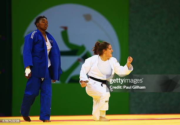 Guusje Steenhuis of the Netherlands celebrates victory over Audrey Tcheumeo of France in the Women's Judo -78kg Bronze Final during day fifteen of...