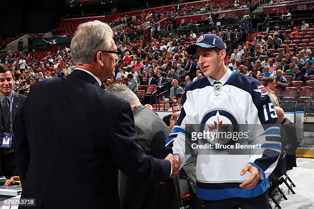 Jansen Harkins reacts after being selected 47th overall by of the Winnipeg Jets during the 2015 NHL Draft at BB&T Center on June 27, 2015 in Sunrise,...