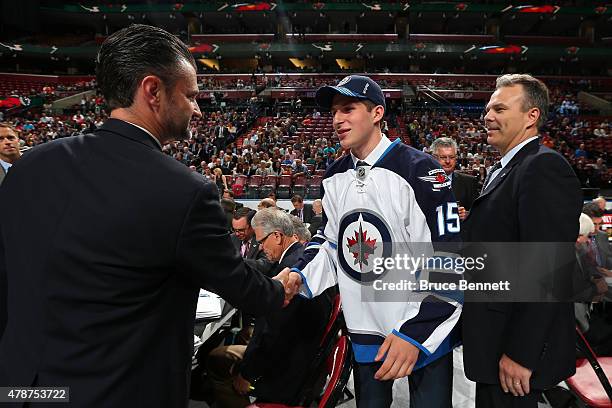 Jansen Harkins reacts after being selected 47th overall by of the Winnipeg Jets during the 2015 NHL Draft at BB&T Center on June 27, 2015 in Sunrise,...