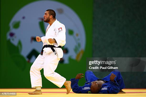 Toma Nikiforov of Belgium celebrates victory over Jorge Fonseca of Portugal in the Men's Judo -100kg Bronze Final during day fifteen of the Baku 2015...