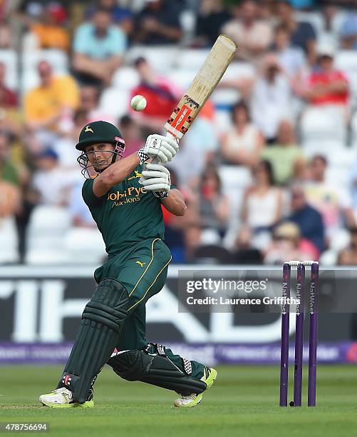 James Taylor of Nottinghamshire smashes the ball to the boundary during the NatWest T20 Blast match between Nottinghamshire Outlaws and...