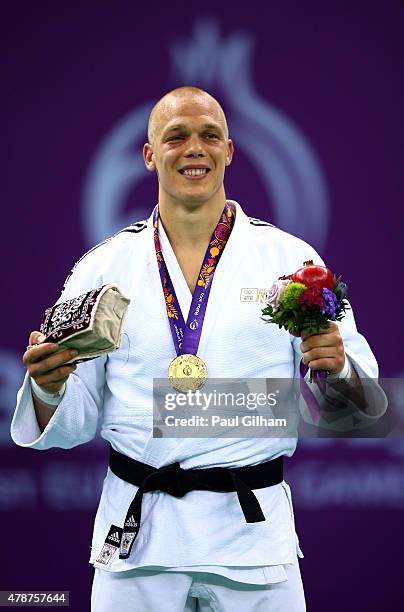 Gold medalist Henk Grol of the Netherlands stands on the podium during the medal ceremony for the Men's Judo -100kg during day fifteen of the Baku...