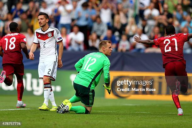 Julian Kob and goalkeeper Marc Andre ter Stegen of Germany look dejected during the UEFA European Under-21 semi final match Between Portugal and...
