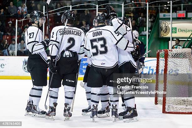 Vincent Dunn of the Gatineau Olympiques celebrates his second-period goal with teammates Frank Schumacher, Emile Poirier and Martin Reway against the...