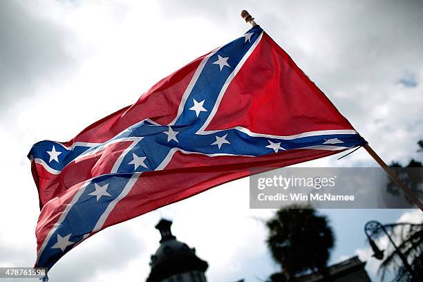 Demonstrators protest at the South Carolina State House calling for the Confederate flag to remain on the State House grounds June 27, 2015 in...