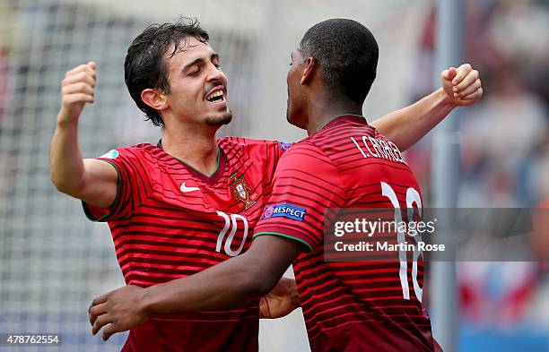 Ivan Cavaleiro of Portugal celebrate with team mate Bernardo Silva after scoring the 3rd goal during the UEFA European Under-21 semi final match...