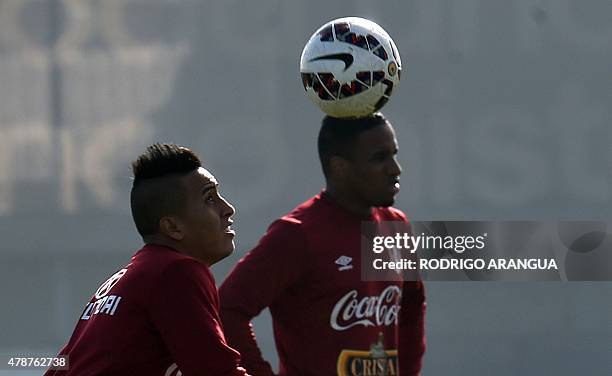 Peru's midfielder Christian Cueva plays with a ball during a training session in Santiago on June 27, 2015 during the Copa America football...