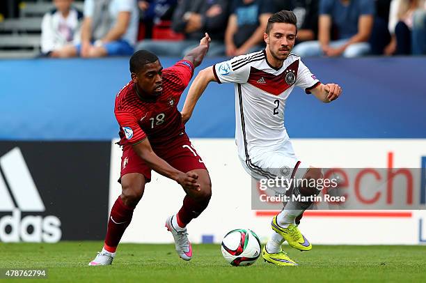 Ivan Cavaleiro of Portugal and Julian Korb of Germany battle for the ball during the UEFA European Under-21 semi final match Between Portugal and...