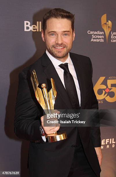Actor Jason Priestley, winner of the Best Perfomance by an Actor in a Continuing Leading Comedic Role attends the Canadian Screen Awards CBC...