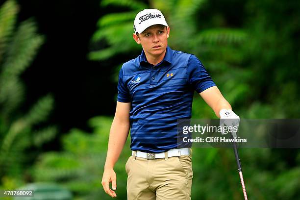 Cameron Smith of Australia plays his shot from the 12th tee during the third round of the Travelers Championship at TPC River Highlands on June 27,...