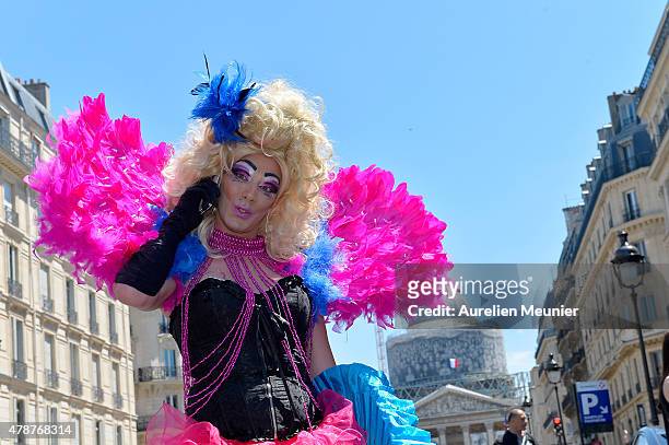 Transsexual posess as thousands of people gather to support gay rights by celebrating during the Gay Pride Parade on June 27, 2015 in Paris, France....