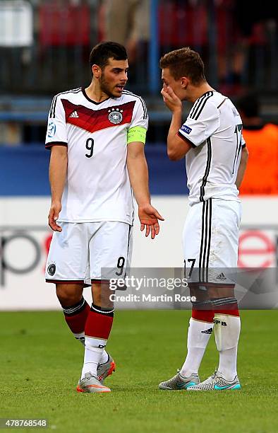 Kevin Volland and Joshua Kimmich of Germany look dejected after the UEFA European Under-21 semi final match Between Portugal and Germany at Ander...