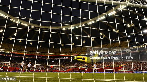 Louisa Necib of France scores her goal during the quarter final match of the FIFA Women's World Cup between Germany and France at Olympic Stadium on...