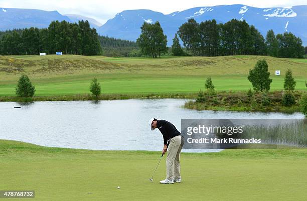 Ross Kellett of Scotland in action on the picturesque 16th green during the third round of the 2015 SSE Scottish Hydro Challenge at the MacDonald...