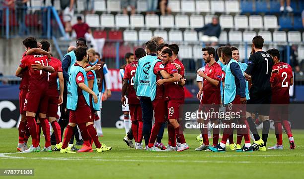 Team members of Portugal celebrate after the UEFA European Under-21 semi final match Between Portugal and Germany at Ander Stadium on June 27, 2015...
