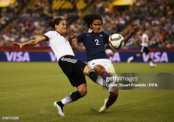 Dzsenifer Marozsan of Germany is challenged by Wendie Renard of France during the quarter final match of the FIFA Women's World Cup between Germany...