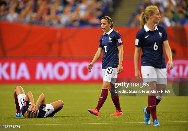 Claire Lavogez of France lays dejected on the pitch during the quarter final match of the FIFA Women's World Cup between Germany and France at...