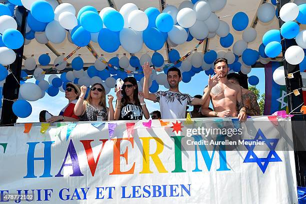 The gay Jew community dancers cheering at the crowd as thousands of people gather to support gay rights by celebrating during the Gay Pride Parade on...