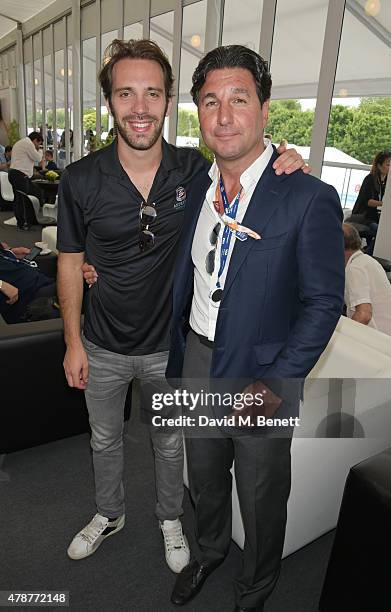 Jean Eric Vergne and Giorgio Veroni attend Day One at the 2015 FIA Formula E Visa London ePrix at Battersea Park on June 27, 2015 in London, England.