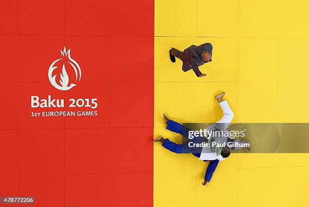 Jorge Fonseca of Portugal is thrown and loses his fight against Toma Nikiforov of Belgium in the Men's Judo -100kg Bronze Final during day fifteen of...