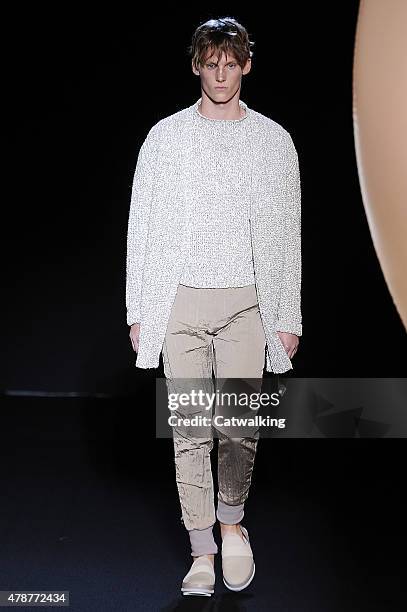 Model walks the runway at the Wooyoungmi Spring Summer 2016 fashion show during Paris Menswear Fashion Week on June 27, 2015 in Paris, France.